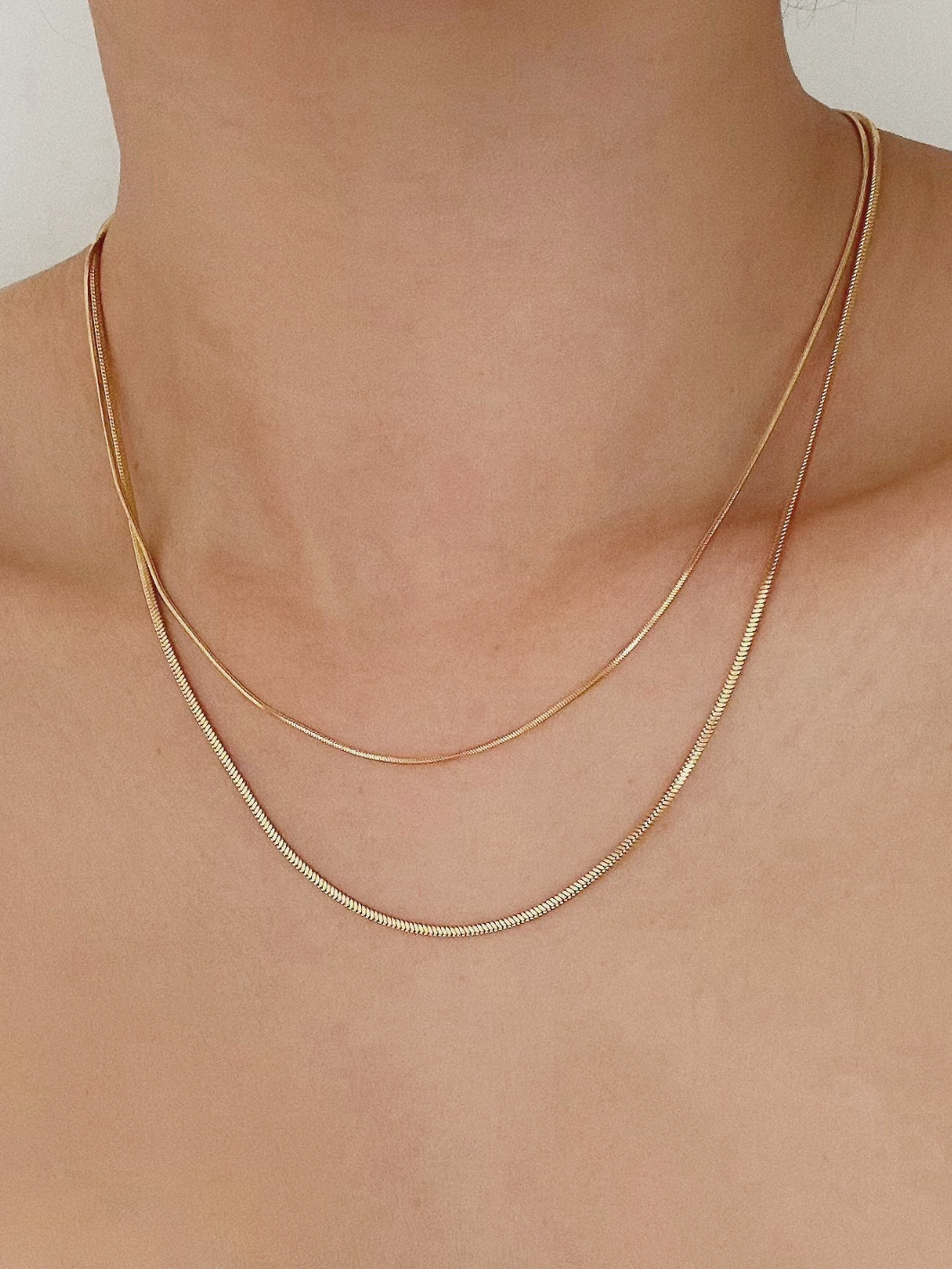 Halsband i stål med 18k guld med ormkedja 1 mm
