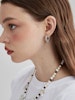 REA Silverfärgade hjärtformade hoops med tvinnade design