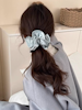 Stor pärlblå scrunchie