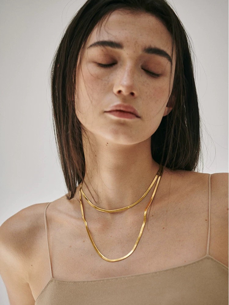 Halsband i stål med 18k guld med ormkedja