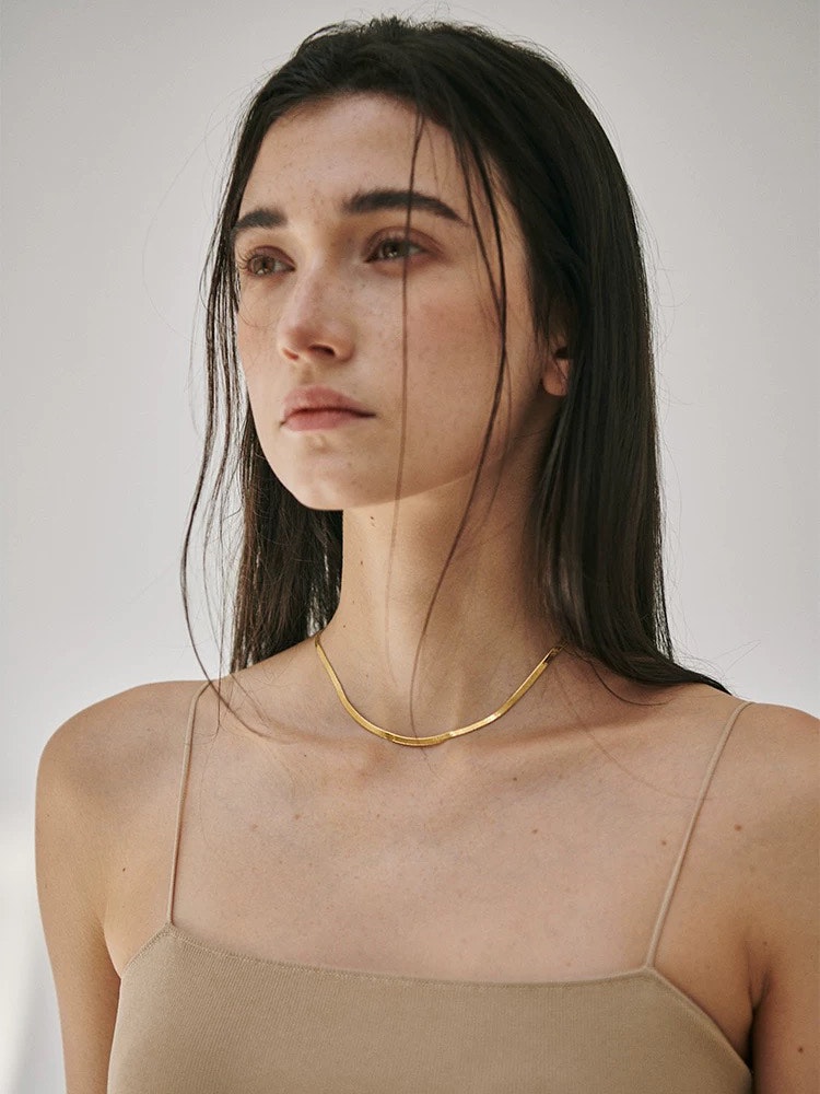 Halsband i stål med 18k guld med ormkedja