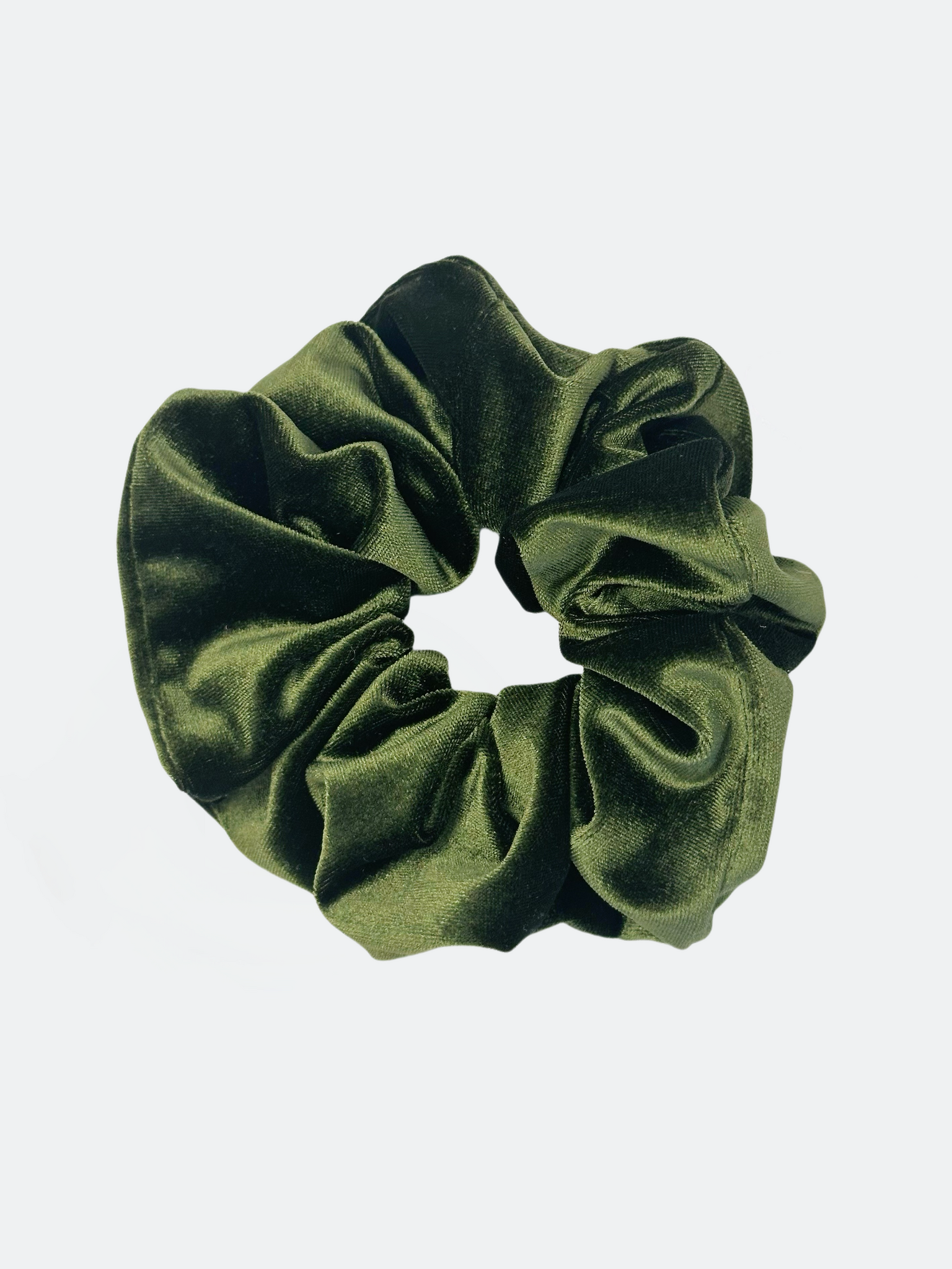Mörkgrön scrunchie i sammetsimitation