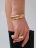 Bangle i stål med 18k guld med räfflade