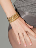 Bangle i stål med 18k guld med räfflade