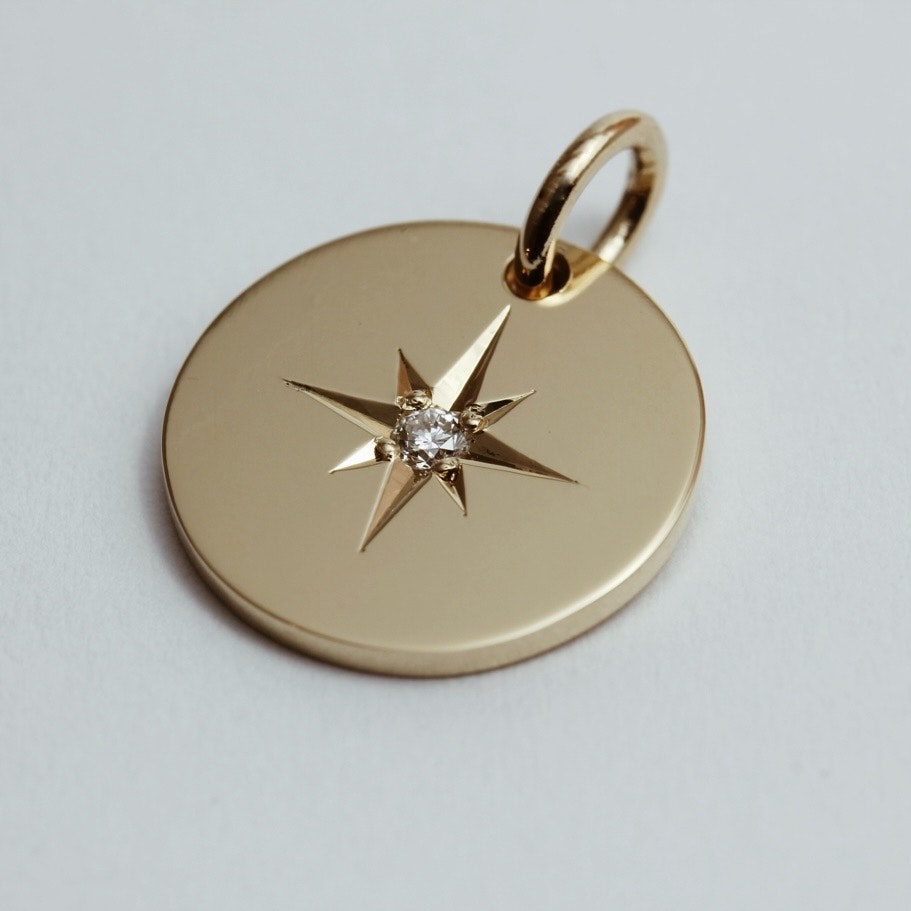 Compass diamant 18k guld