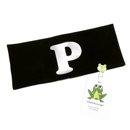 Pannband med bokstav i typsnitt 1, reflexvinyl
