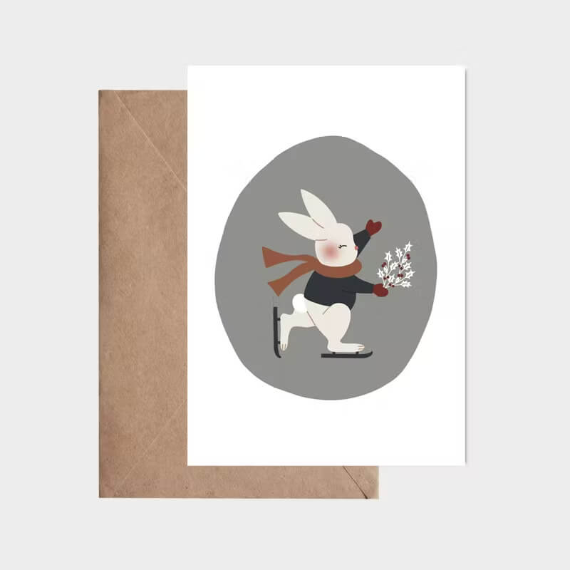 Enkelt kort med kuvert -  Skridskoåkande kanin (Fraktfritt)