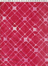 Röda och rosa toner. Ett av tygerna i vår batikrulle "Flamingo"
