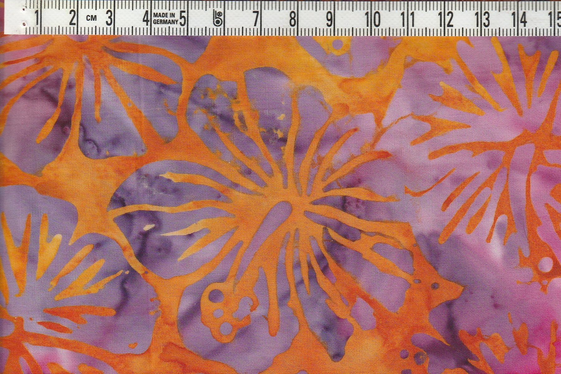 Orangemelerat med orkideér i cerise och lila Bomull 110 cm