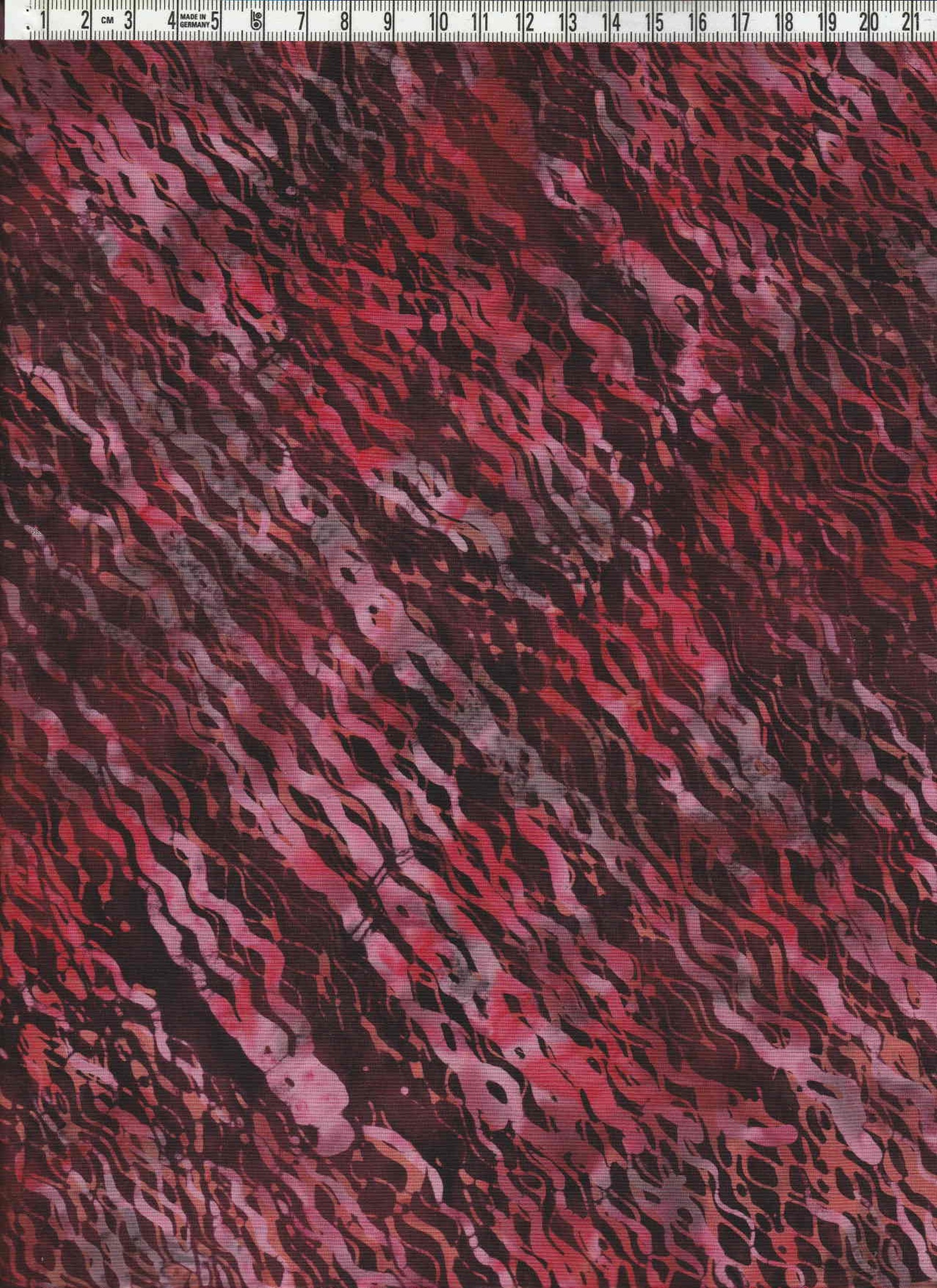 Diagonalmönstrat med mäktiga röda, rosa och svarta färger