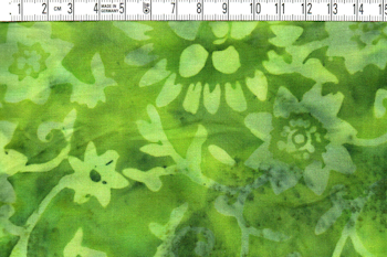 Grön med grönt tryck. 135 cm bred. Viskos batik