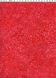 Röd med ljusare "riskorn" . Bomullsbatik bredd 110 cm