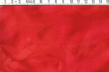 Rött på rött i magnifika färger. Bomull 110 cm