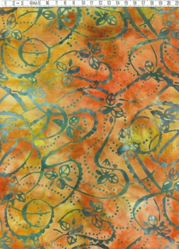 Snirkligt bladmönster i orange och grönt – Viskos Batik 110 cm bred