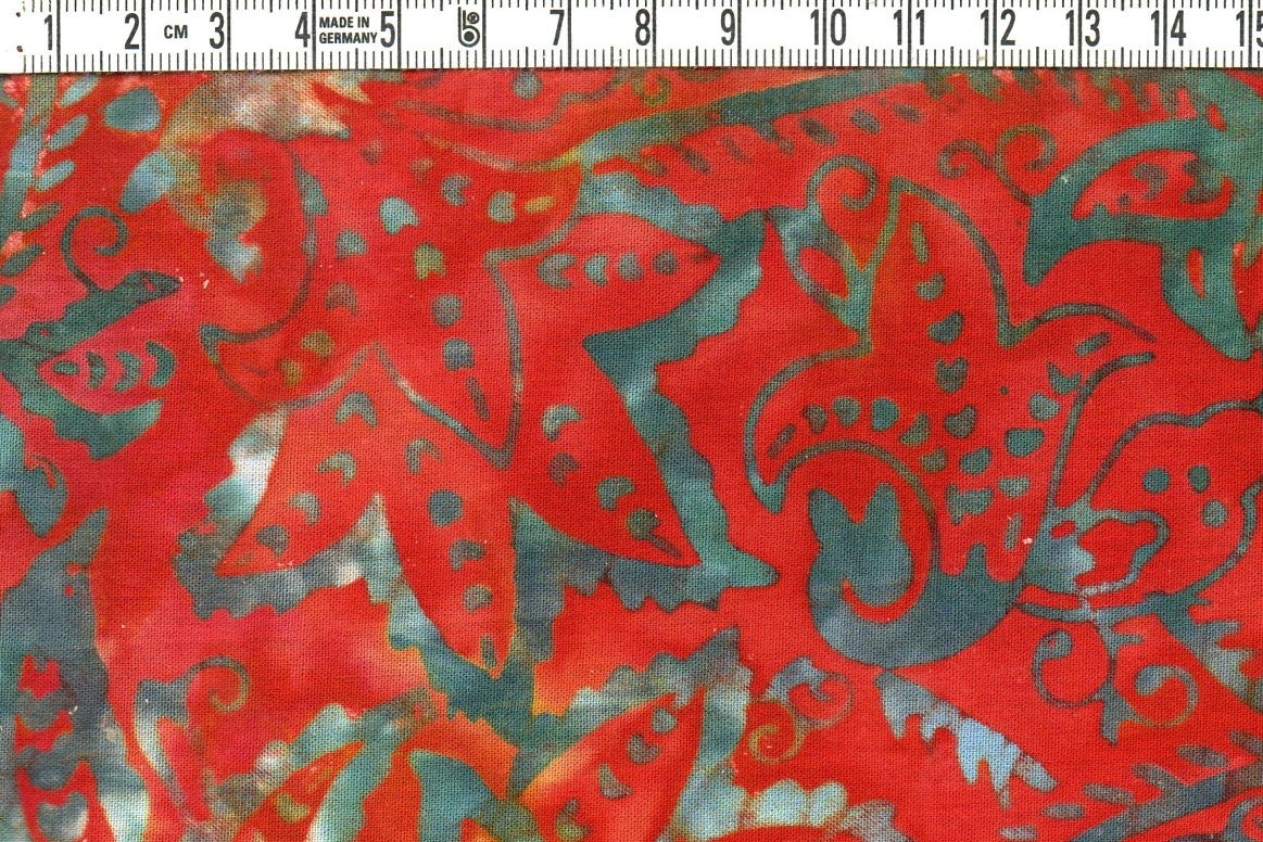 Flammande läckert. Ett tyg som syns. Viskosbatik 110 cm bred