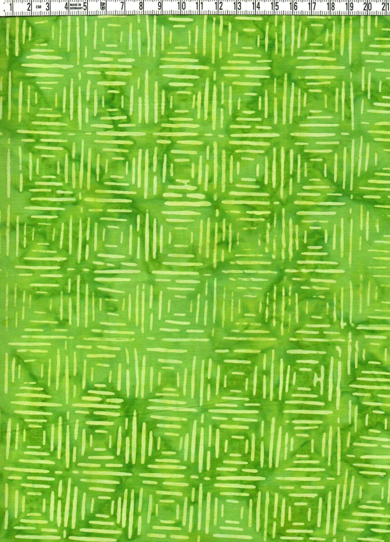 Limegrönt och ljusgrönt.  Batik bomull 110 cm