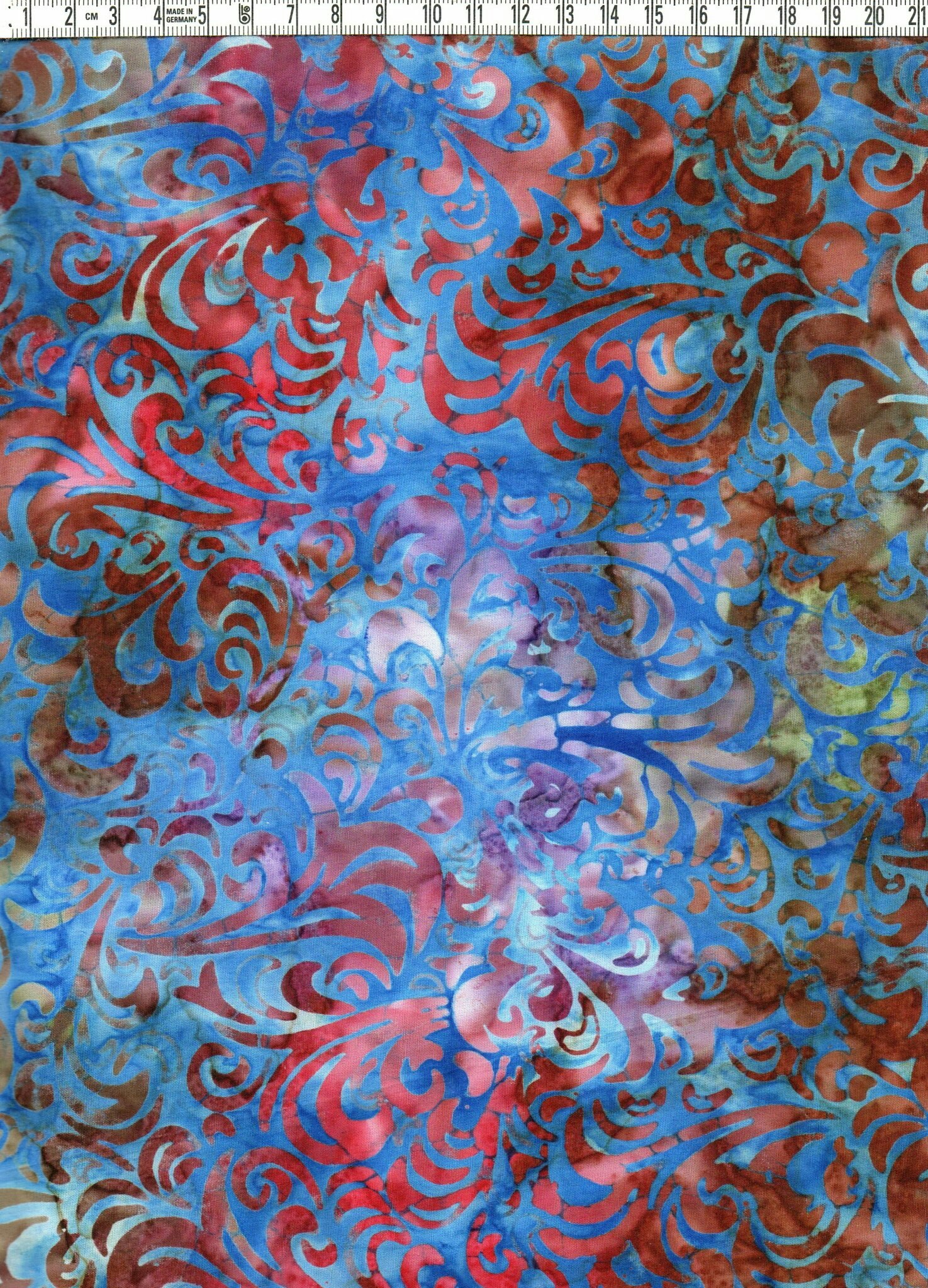 Blå-brun-röd sensation. Titta & njut. Batik bomull 110 cm