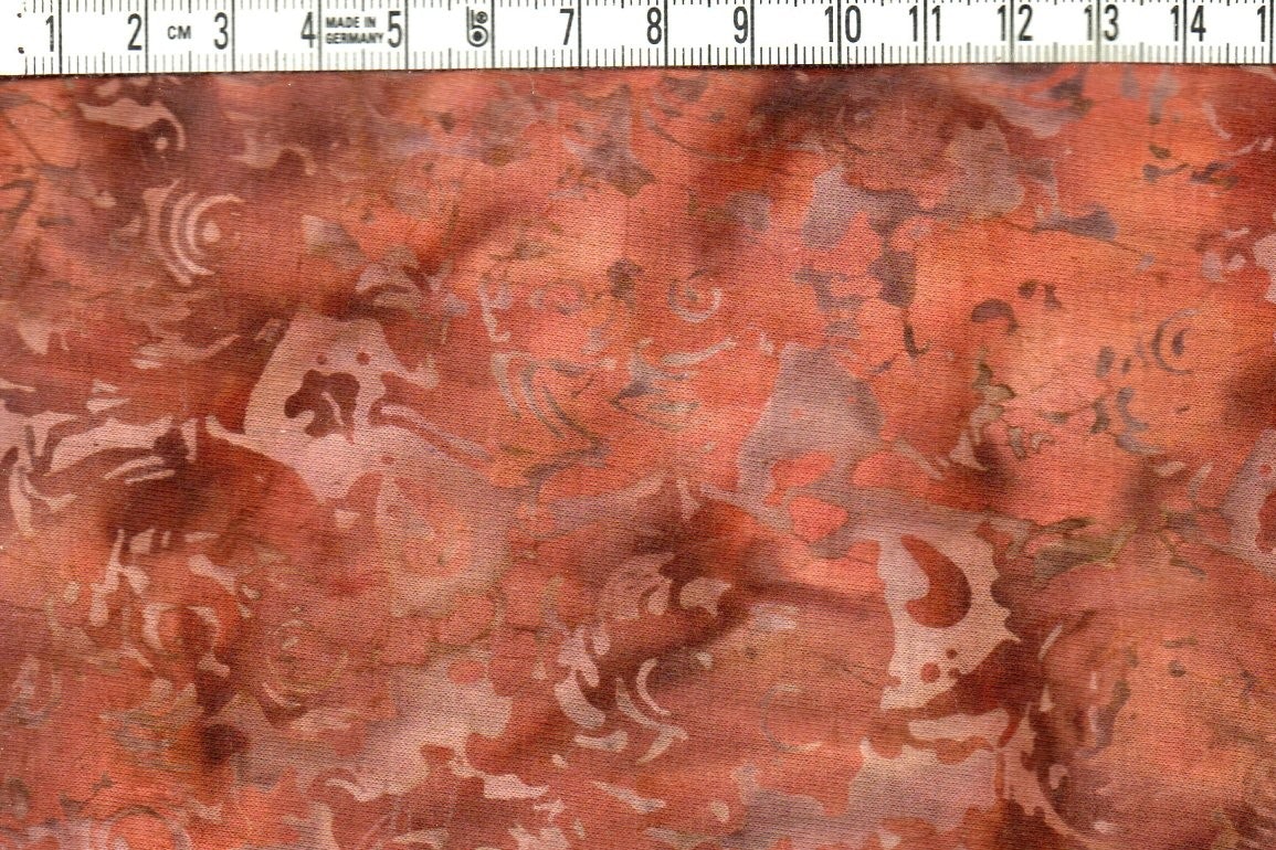 Brun & rödbrun.  Trikå 100% bomull. Bredd 135 cm