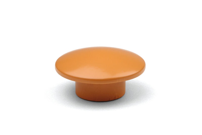 Träknopp som är målat i orange färg.