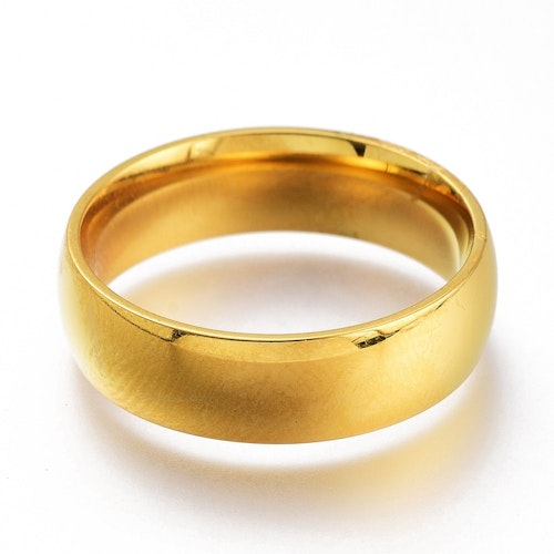 Ring bred av guldfärgat rostfritt stål