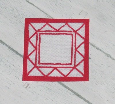Liten röd duk ca 35 x 35 mm