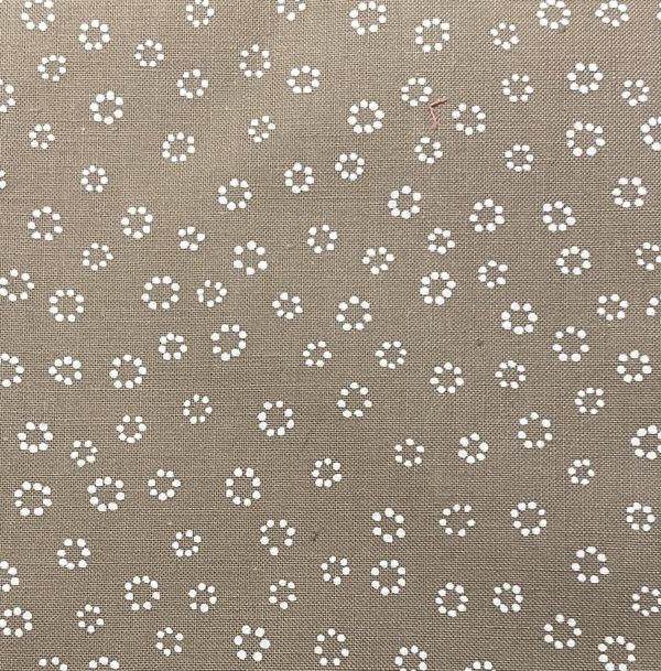 Tyg, beige med vit blomma