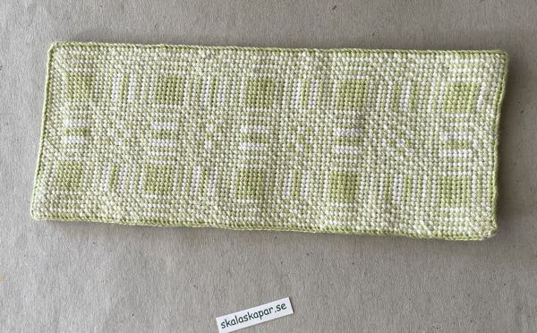 Broderad matta