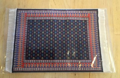 Vävd matta blåröd ton, ca 100 x 155 mm