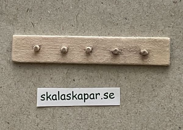 Knoppbräda i trä