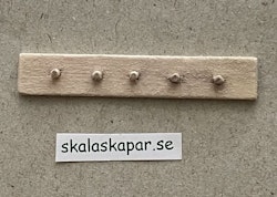 Knoppbräda i trä