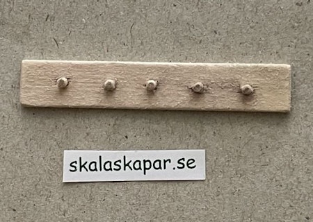 Knoppbräda i trä