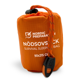Nödsovsäck med nödvisselpipa