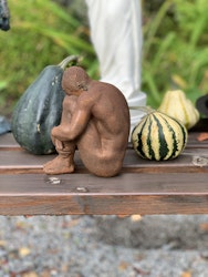 Figurin man i polystone