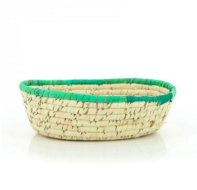 Oval påskkorg av palmblad. Kan fyllas med påskgodis, påskägg och små presenter. Fair Trade.
