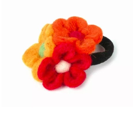 Hårsnodd, hårband med tre blommor, rösd, ockragul & orange. Handtovade i Nepal för Fair Trade.