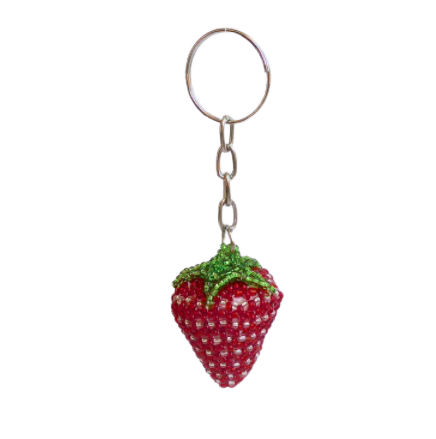 Nyckelring av små glaspärlor, formen är en jordgubbe. Lysande röd färg. Present eller maskot. Tålmodigt och skickligt pärlad av mayakvinnor  för Fair Trade.