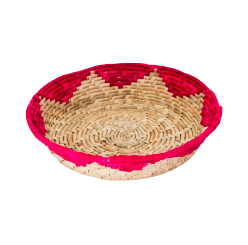 Korg i naturfärg med ceriserosa mönster, Bra för frukt eller bröd, men tål även heta grytor direkt från ugnen.
