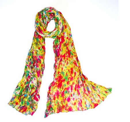 Sjal, scarf, med ett fint färgmönster som påminner om en Sommaräng. Grön-gul-röd-vit, bomull. Fair Trade.
