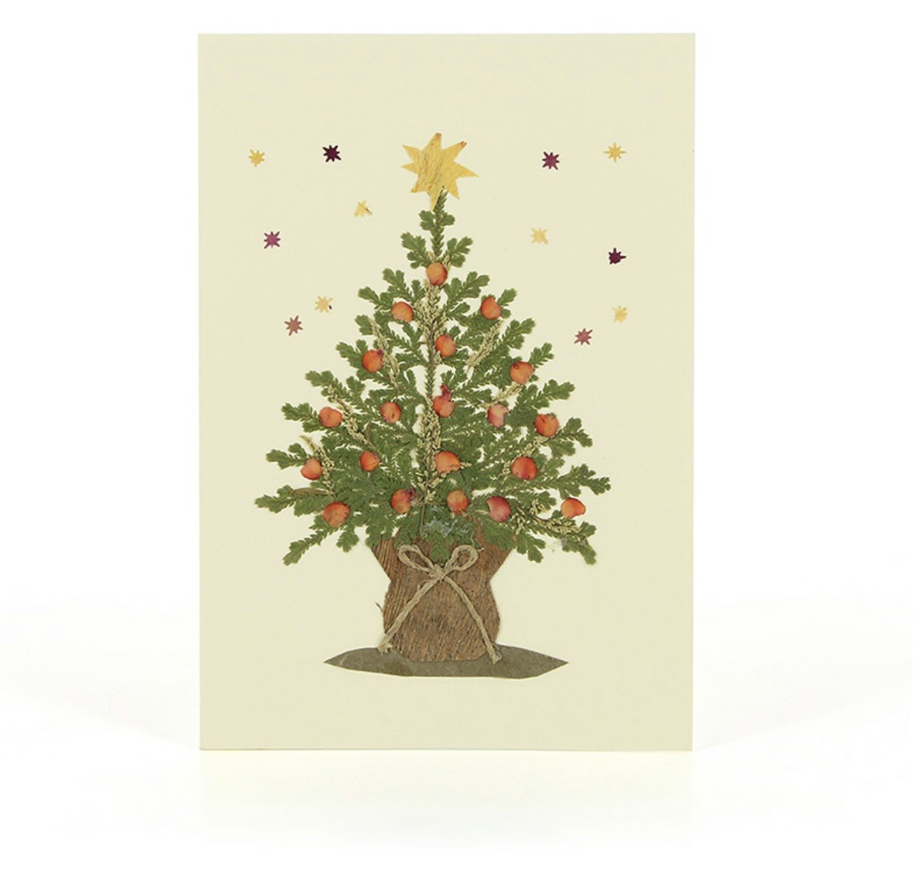 God jul! litet brevkort med kuvert, torkade blommor. Handgjort i El Salvador för Fair Trade..