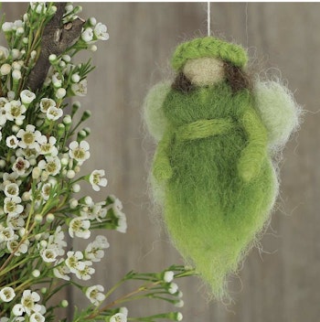 Liten god fe, ängel, maskot, tovad, grön
