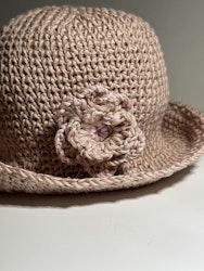 Rosa hatt med blomma