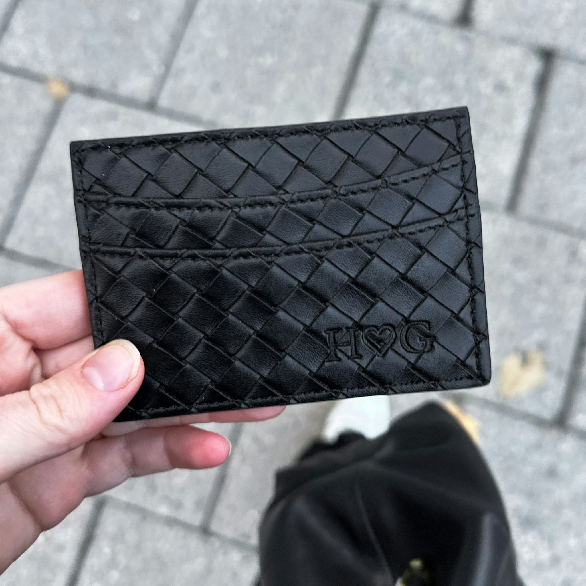 Svart flätad korthållare