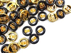 K287 Knapp 18 mm svart/guld (25 st)