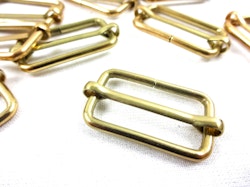 S646 Rörlig spännare metall 25 mm guld (10/100 st)