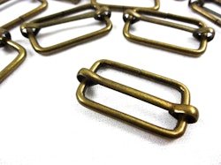 S646 Rörlig spännare metall 25 mm antikguld (10/100 st)