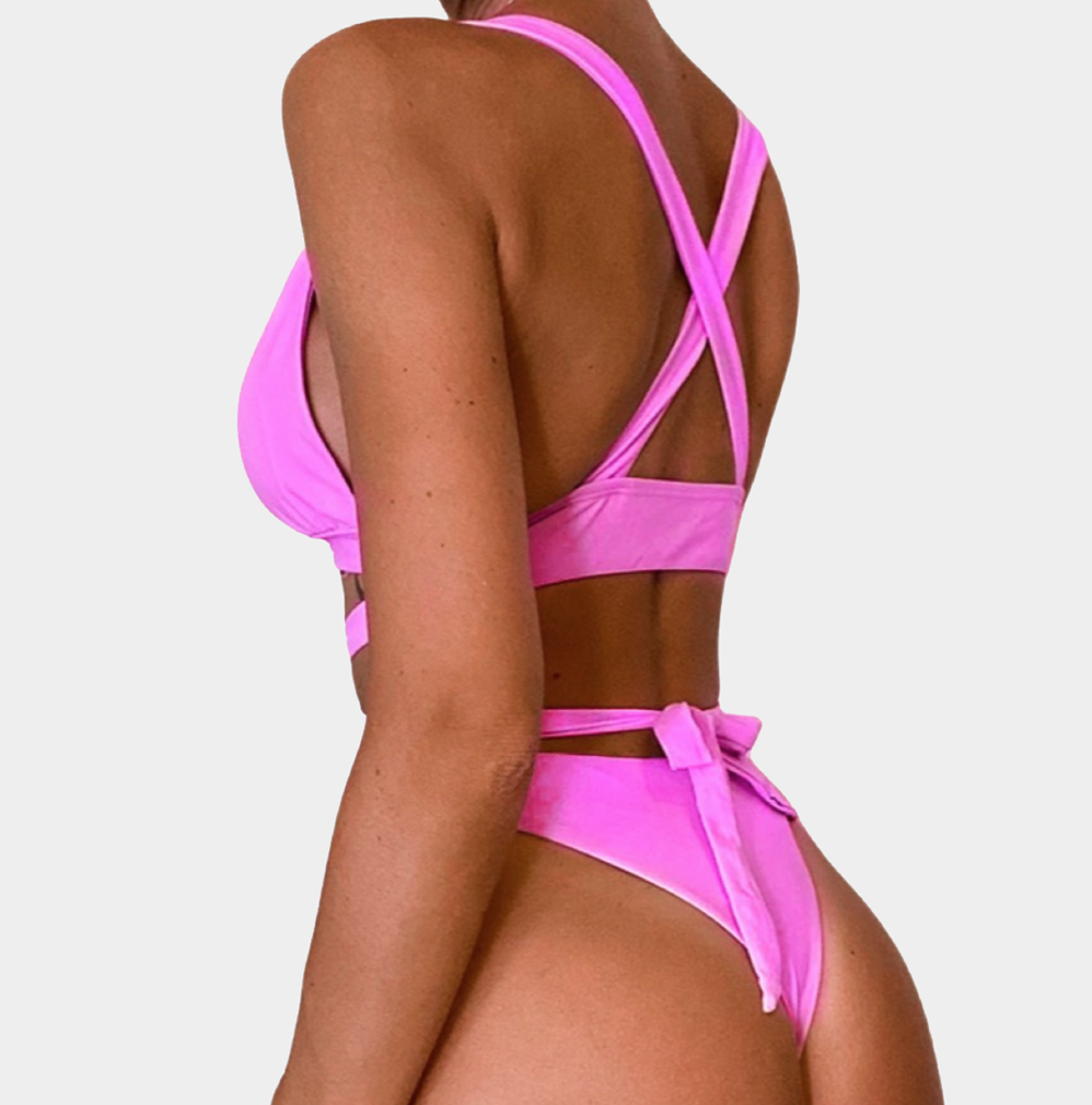 knallrosa bikini med korsad rygg