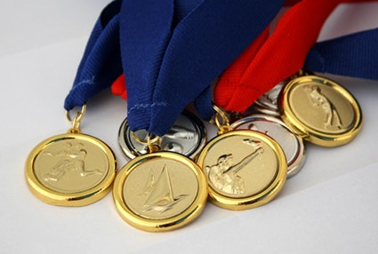 Medalj i storlek 32 mm med valfritt idrottsmotiv