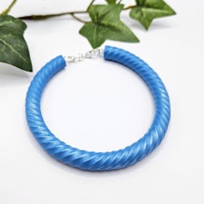 Skimrande blått armband
