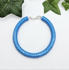 Skimrande blått armband