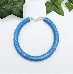 Skimrande blått armband